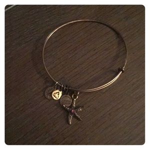Alex and Ani starfish bangle in gold w/ pink stone